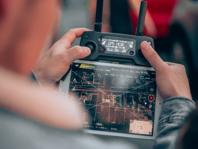 Man with drone controller